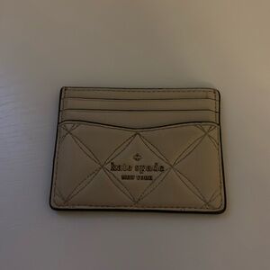 Kate Spade stitched leather card holder
